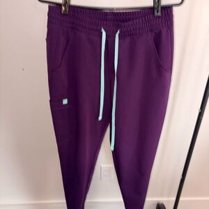 Vibrant Purple Scrubs with Aqua Accents